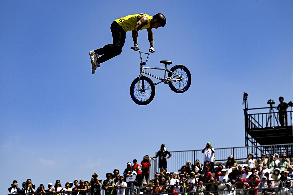 瓦力棋牌游戏-包含澳大利亚自行车选手也，“追”得第一名的词条